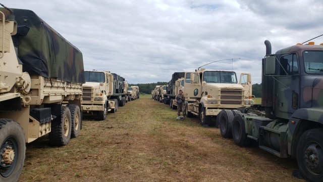 Ohio Army National Guard vehicles line up in southern Louisiana to provide transportation support during Hurricane Ida recovery efforts, Sept. 13-25, 2021. Ohio provided about 70 vehicles and 170 Soldiers during the deployment, and were among...