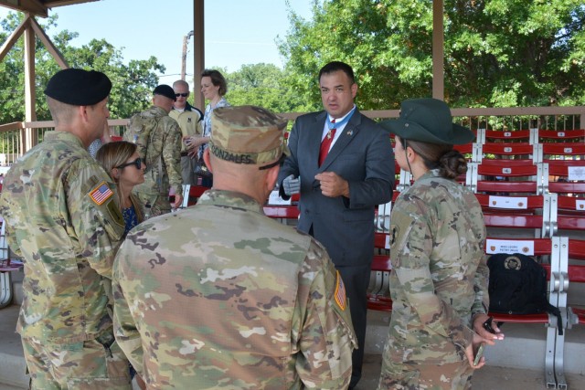 Medal of Honor recipient and retired Master Sgt. Leroy Petry talks with Fort Sill Soldiers following a Basic Combat Training graduation at Fort Sill, Oklahoma. Petry was awarded the Medal of Honor for his actions May 26, 2008, in Afghanistan. (U.S. Army photo by 1st Lt. Vira Miller)