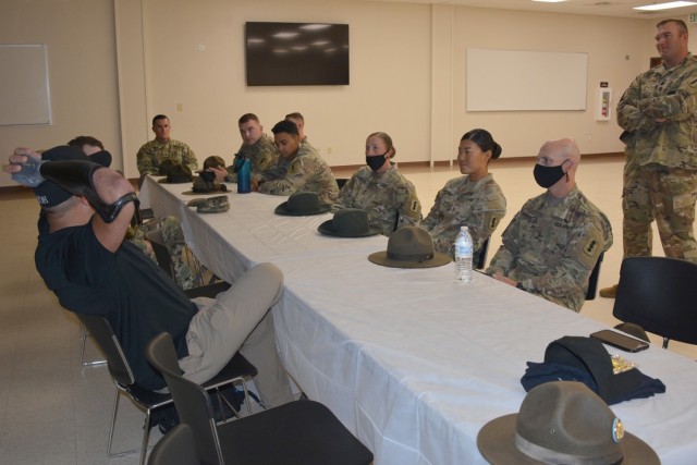 Medal of Honor recipient and retired Master Sgt. Leroy Petry talks with drill sergeants from 1st Battalion, 19th Field Artillery during his visit to Fort Sill, Oklahoma in August. Petry expressed his thanks for the job drill sergeants do preparing Soldiers for the rigor of Army life. (U.S. Army photo by 1st Lt. Vira Miller)