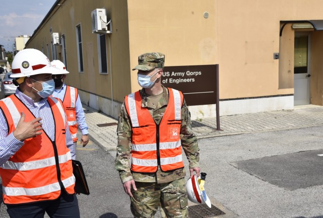U.S. Army Corps of Engineers, Europe District Southern Europe Area Engineer Bryce Jones discusses ongoing construction projects at Caserma Ederle, part of U.S. Army Garrison Italy in the Vicenza area, during a tour of the installation with Europe...