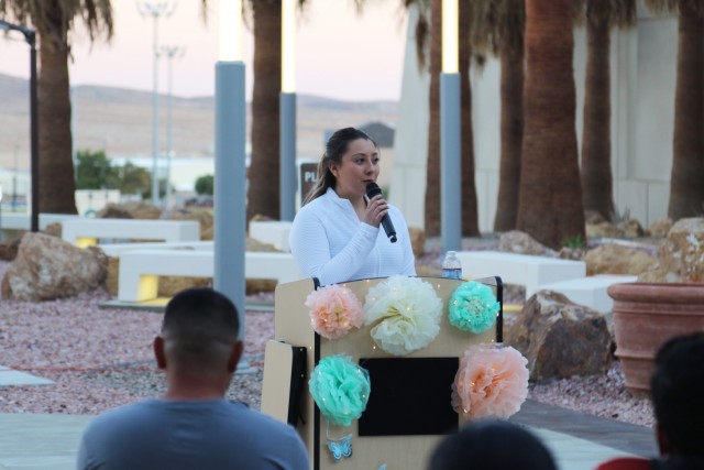 Cpl. Vanessa Rodriguez, a practical nursing specialist with Weed Army Community Hospital's Medical-Surgical Ward, speaks during the hospital’s Light the Night: Pregnancy and Infant Loss Remembrance event October 15, at Weed ACH on Fort Irwin, Calif. (Photo by Kimberly Hackbarth/ Weed ACH Public Affairs Office)