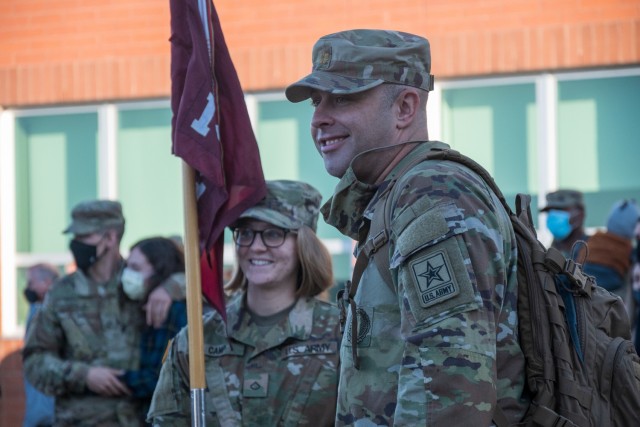 U.S. Army Maj. Shawn Pyer, former commander of the 142nd Medical Company, meets with members of the unit outside the Army Aviation Support Facility in Windsor Locks, Conn. on Oct. 24, 2021. The unit was mobilizing in support of Operation Atlantic Resolve and heading to Texas before deploying to Poland.