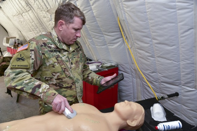 Lt. Col. Brett Gendron, a 65D Emergency Medicine Physician Assistant at the Brooke Army Medical Center, tests one of the four Ultrasound Field Portable at a test conducted by the U.S. Army Medical Test and Evaluation Activity.