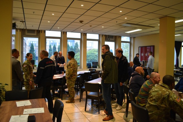Members of U.S. Army law enforcement and host nation civilian and military law enforcement gather at the 3 Star Restaurant for breakfast and camaraderie at U.S. Army Garrison Benelux - Brussels Oct. 20 in Zaventem, Belgium. (U.S. Army photo by...