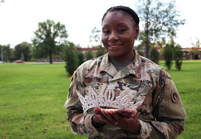 Master Sgt. Diana Layne, executive assistant to the command sergeant major, 1st Theater Sustainment Command, celebrates being chosen as United States of America Ms. Kentucky 2022 at Fort Knox, Kentucky, Oct. 12, 2021. (U.S. Army photo by Sgt. Owen Thez)