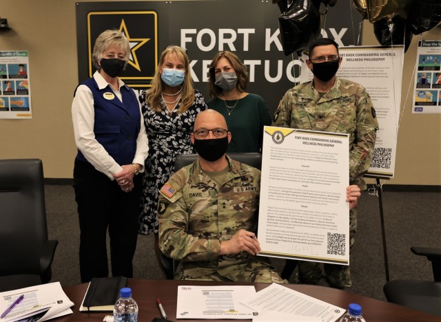 Commanding General of U.S. Army Cadet Command and Fort Knox Maj. Gen. Johnny Davis signs his newly established wellness philosophy proclamation Oct. 28, 2021.