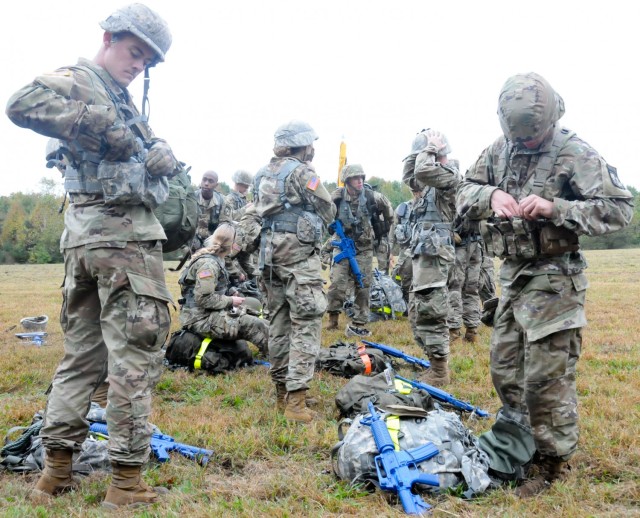 Reserve Officers' Training Corps cadets from Drexel University check their gear during this year’s 2nd Brigade Ranger Challenge Competition held Oct. 22-24 at various training areas on Joint Base McGuire-Dix-Lakehurst, New Jersey. Ranger...