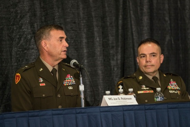 Left, Maj. Gen. Joe Robinson, 3rd Medical Command [Deployment Support] commander, discusses the Army&#39;s response to the COVID-19 pandemic during an Association of the U.S. Army Annual Meeting and Exposition panel in Washington D.C. on Oct. 13, 2021. 