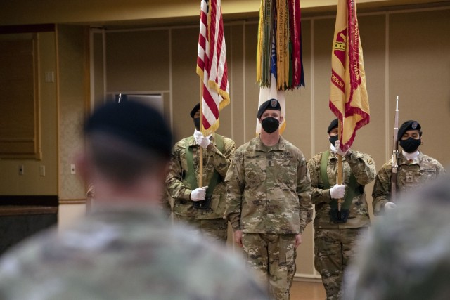 Sgt. Maj. Bradley Lanchester, sergeant major for Fort Jackson's Directorate of Emergency Services, stands at attention as the official party enter a change of responsibility ceremony Oct. 27 at the NCO Club on Fort Jackson.