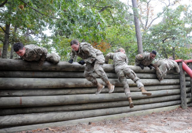 Reserve Officers' Training Corps cadets from several schools in the northeastern United States navigate the Obstacle Course event during this year’s 2nd Brigade Ranger Challenge Competition held Oct. 22-24 at various training areas on Joint Base McGuire-Dix-Lakehurst, New Jersey. Ranger Challenge is designed to test cadets’ mental and physical toughness, and to develop leadership while fostering teamwork and esprit-de-corps as teams participate in a series of graded events. (U.S. Army photo by Mr. Shawn Morris, 99th Readiness Division Public Affairs)