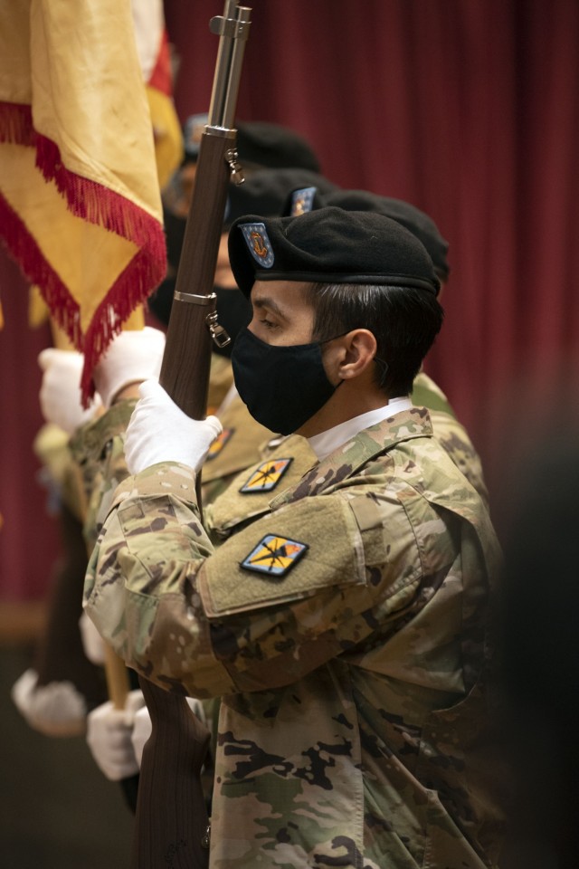 A member of the Fort Jackson honor guard goes to order arms with a ceremonial M1 Garand rifle during a change of responsiblity ceremony where Garrison Command Sgt. Maj. R. Cesar Duran took responsibility for the unit from Command Sgt. Maj. Algrish Williams Oct. 27 at the NCO Club on post.