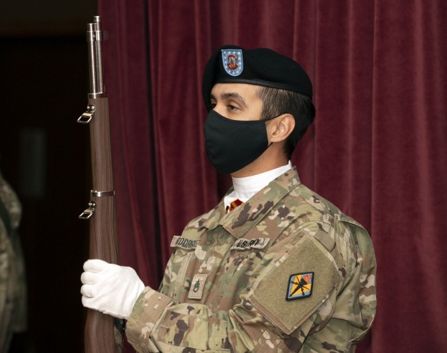 A member of the Fort Jackson honor guard practices presenting arms with a ceremonial M1 Garand rifle before a change of responsiblity ceremony where Garrison Command Sgt. Maj. R. Cesar Duran took responsibility for the unit from Command Sgt. Maj. Algrish Williams.