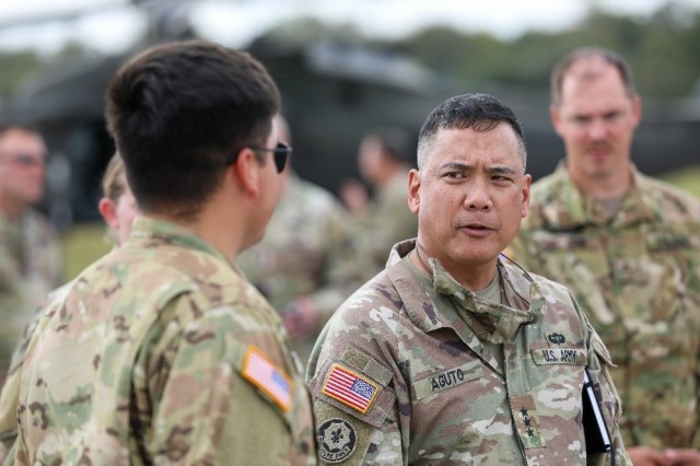 U.S. Army Lt. Gen. Antonio Aguto, commanding general of First Army visits with mobilizing Soldiers of the 11th Expeditionary Combat Aviation Brigade, U.S. Army Reserve, at North Fort Hood, TX on October 26, 2021. 