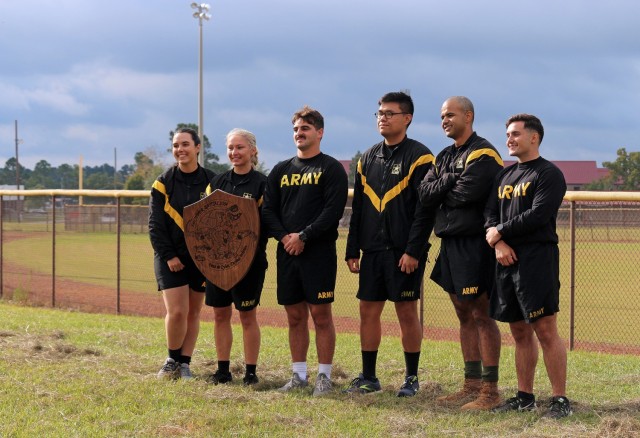 'Team Tres' shows off their winner's plaque at the conclusion of the 1st Cyber Battalion "mungadai" 24-hour challenge, at Fort Gordon, Ga., Oct. 22, 2021. (Photo by Bill Roche)