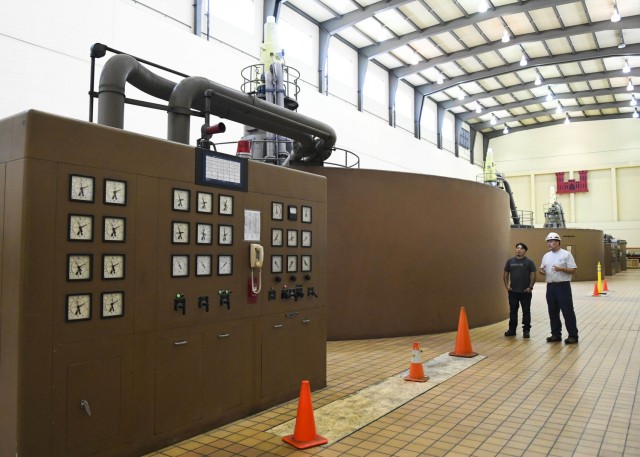 Old Hickory Senior Mechanic Greg Forte walks Thomas Yan, Antioch Middle School science teacher, through the Old Hickory Hydropower Plant Oct. 26, 2021 while he explains just what it takes for an average day’s routine. The dam is located on the Cumberland River in Hendersonville, Tennessee. (USACE Photo by Misty Cunningham)