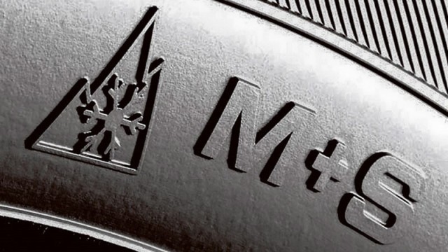Tire showing both M+S and Alpine symbols. Photo courtesy of garrison safety office.