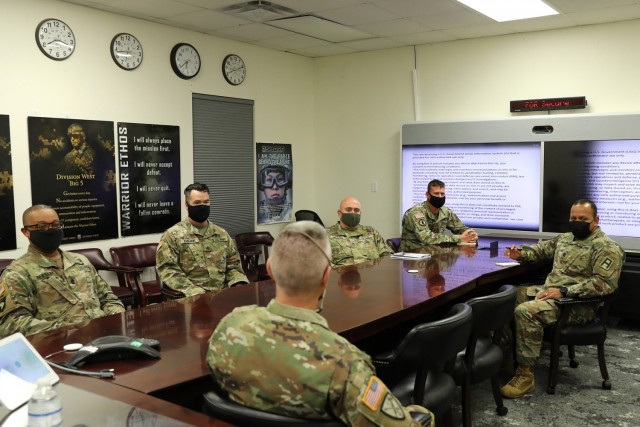 Command Sgt. Maj. Steven Slee, center, command sergeant major for the 85th U.S. Army Reserve Support Command, meets with Soldiers from the 2nd Battalion, 381st Regiment during his visit to Fort Hood, Texas, October 21, 2021. The 2-381st is one of...