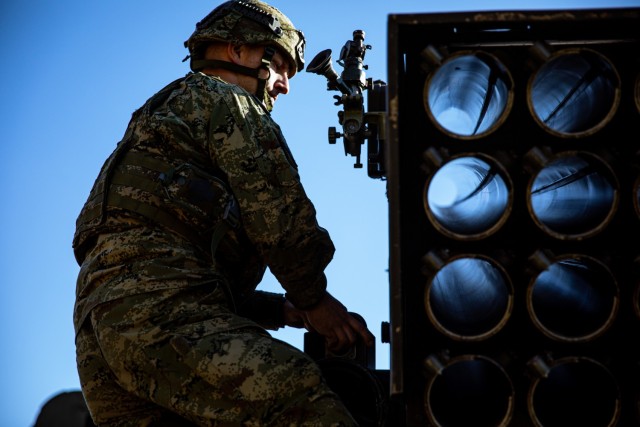 Croatia Land Forces Privat Ivan Kudric, from Storm Battery, takes fire elements on a Multiple Rocket Launcher System sighting device during Rifle Focus at Bemowo Piskie Training Area, Poland, October 8, 2021. Rifle Focus is a force-on-force...