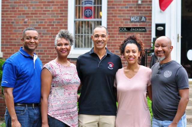 Col. Eric Jackson, his wife, Tonya Jackson, Maj. Gen. Robert Edmonson II, his wife, Ellen Edmonson and Brian Jackson meet in-person for the first time as a family on Fort Knox, Kentucky. 