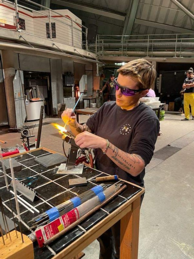 Staff Sgt. Stacy Englert, a Soldier assigned to the Joint Base Lewis-McChord Soldier Recovery Unit, Washington, attended a glass blowing class held at a museum. This July, the class resumed after being on hold for 14 months due to the COVID-19 pandemic. (Photo courtesy of David Iuli)