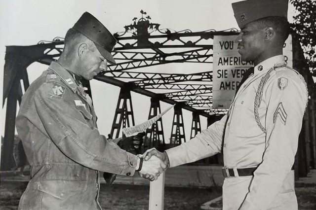 Robert L. Edmonson is pictured while reenlisting in Berlin, Germany in 1961. 