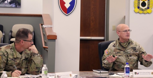 Brig. Gen. Gavin Gardner (left), Commanding General of U.S. Army Joint Munitions Commands, takes notes as Gen. Ed Daly, Commander of U.S. Army Materiel Command and the service’s senior sustainer, discusses how the Army must adapt to the 21st-century environment.