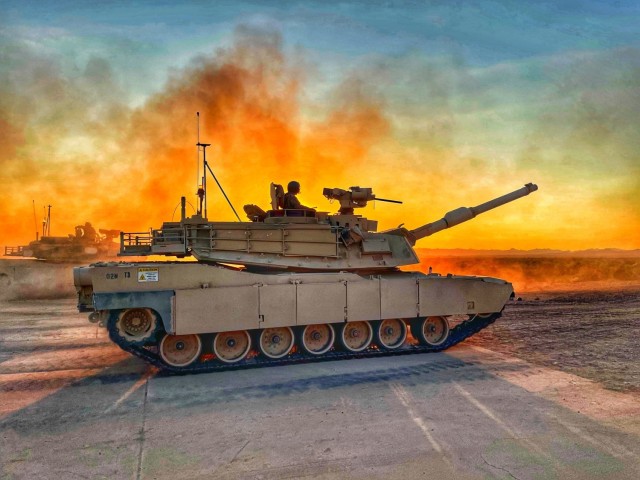 Soldiers assigned to Crazy Horse Company, 1st Battalion, 8th Infantry Regiment, 3rd Armored Brigade Combat Team, 4th Infantry Division test the XM-1147 Advanced Multi-Purpose (AMP) round at the Yuma Proving Grounds in Yuma, Arizona, Sept. 2021.
(U.S. Army photo illustration courtesy of Maj. Michael Brabner; Color modified)
