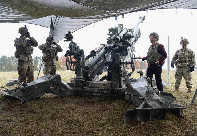Secretary of the Army Christine Wormuth learns how to shoot an M777 howitzer with 173rd Airborne Brigade Sky Soldiers in Hohenfels, Germany, Oct. 27, 2021. Col. Michael Kloepper, 173rd Airborne Brigade commander, said there is no more appropriate place for the Secretary of the Army to meet Sky Soldiers than on an artillery live fire range during a brigade collective training density.
(U.S. Army photo by Staff Sgt. Keisha Brown)