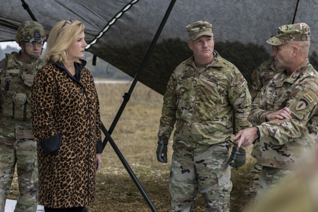 U.S. Army Brig. Gen. Joseph E. Hilbert, commanding general of 7th Army Training Command, speaks to the Honorable Christine Wormuth, U.S. Secretary of the Army, at Grafenwoehr Training Center on Oct. 27, 2021. Wormuth visited Germany on behalf of the U.S. Army as a symbol of U.S and German strong transatlantic ties for over 75 years. “Our legacy of partnership is built on the foundation of partnership between us and Germany and our shared vision of a Europe whole and free,” said Wormuth. (U.S. Army photo by Sgt. Cory Reese)