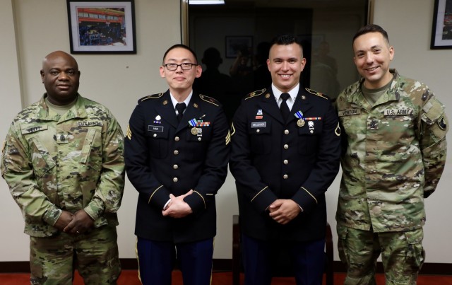 From left to right, Sgt. Maj. Dennis Petty, 38th Air Defense Artillery Brigade operations sergeant major; Sgt. Andrew K. Han, Patriot fire control enhanced operator with 10th Missile Defense Battery; Pfc. Louis M. Wellstood, Army intel analyst with 1st Battalion, 1st Air Defense Artillery Regiment; and Command Sgt. Maj. Daniel Venton, 1-1 ADA senior enlisted advisor, gather for a photo after announcing Han and Wellstood as the winners of the 38th ADA 2021 Best Warrior Competition Noncommissioned Officer and Soldier respectively at Kadena Air Base, Japan Oct. 28, 2021.