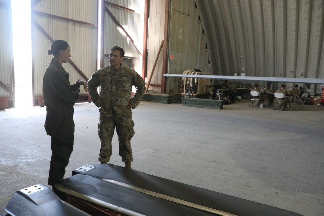 U.S. Marine Corps Sgt. Rachel Myers, an Imperial Beach, California native, and a crew chief assigned to Heavy Marine Helicopter Squadron-361, and U.S. Army Spc. Sean Rende, a Topeka, Kansas native, and a MQ-1C Gray Eagle operator assigned to Fox...