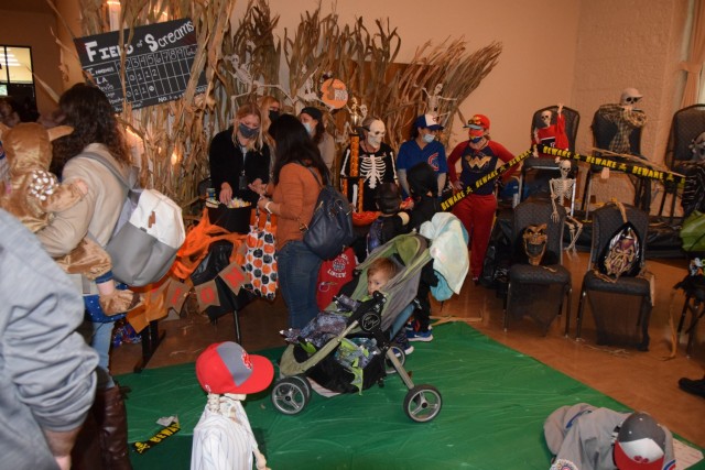 Members of Army Contracting Command - Rock Island give out candy at the Boo on the Rock / Truck or Treat celebration held Oct. 28 in Heritage Hall and the Lock & Lounge area on Rock Island Arsenal. The command earned First Place with their...