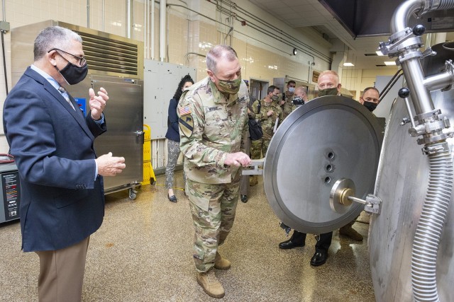 Gen. John M. Murray, Commanding General of U.S. Army Futures Command (AFC), receives an update on Vacuum Microwave Drying Technology and the Close Combat Assault Ration (CCAR) at the Combat Feeding Division during a visit to the U.S. Army Combat...
