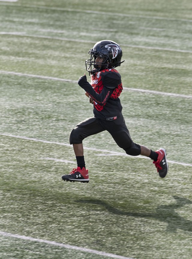 Fort Jackson Falcons running back Christian Keeve races down the field during a long touchdown run near the end of the first half in Falcons' 32-0 victory in the Pop Warner State Championship Oct. 30 at River Bluff High School in Lexington, S.C.