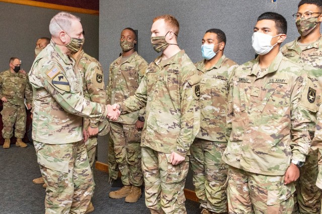 Gen. John M. Murray, Commanding General of U.S. Army Futures Command (AFC), greets Human Research Volunteer (HRV) Soldiers during a visit to the U.S. Army Combat Capabilities Development Command (DEVCOM) Soldier Center in Natick, Massachusetts on October 26, 2021.