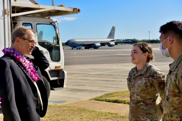Dr. Brian Lein, Defense Health Agency assistant director, talks with Senior Airman Aubrey Rowe, 15th Operational Medical Readiness Squadron independent duty medical technician, about the medical airlift mission at Joint Base Pearl Harbor-Hickam,...