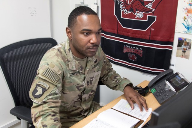 Sgt. 1st Class Terrence T. Conyers participates in a virtual meeting at the 266th Finance Support Center headquarters at Camp Arifjan, Kuwait, on Oct. 20, 2021. The native of Manning, S.C., has been deployed to Kuwait since June in support of the...