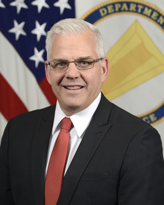 Christopher J. Lowman, Deputy Assistant Secretary of the Army (Aquisition, Logistics and Technology), Headquarters Department of the Army, poses for his official portrait in the Army portrait studio at the Pentagon in Arlington, Va., Nov, 19, 2018.  (U.S. Army photo by Monica King)