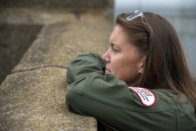 April Richards, a park ranger for the U.S. Army Corps of Engineers Pittsburgh District, looks downstream from her favorite spot above the Conemaugh River Lake dam in Saltsburg, Pennsylvania, Oct. 22, 2021. Richards said this spot provides a...