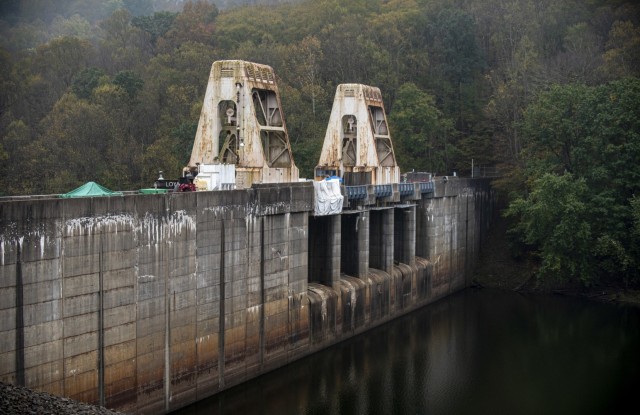 A view of the Loyalhanna Lake dam, put into operation in 1942, in Saltsburg, Pennsylvania, Oct. 22, 2021. Its concrete face has turned rust-colored and dark grey after 80-plus years of operation. The top of the dam is going through reconstruction...