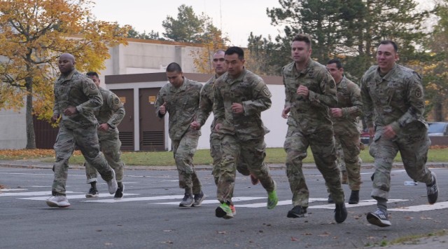 Competitors begin the run portion of the Army Combat Fitness Test during the Fiscal Year 2022 30th Medical Brigade and Regional Health Command Europe Best Medic Competition Oct. 30. (U.)S. Army Photo by Spec. Xuyang Zhao