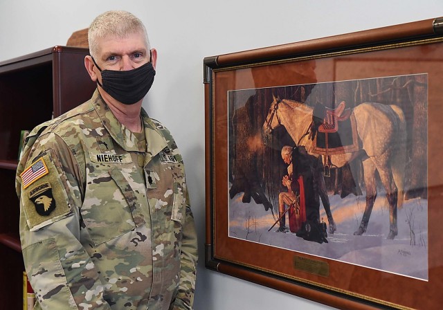 Chaplain (Lt. Col.) Kevin Niehoff stands next to a print of the famous painting “The Prayer at Valley Forge” hanging in his office at the U.S. Army Sustainment Command headquarters building at Rock Island Arsenal, Illinois, Oct. 7. Niehoff arrived in June and brings 20-plus years of experience as an Army chaplain. (Photo by Jon Micheal Connor, ASC Public Affairs)