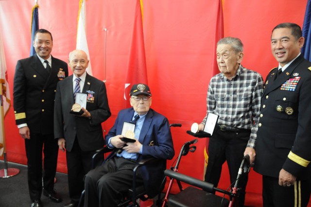 Retired Army Veterans; (from left to right) Harry Jung, Raymond Lee and Paul Toy recognized with the Congressional Gold Medal Nov. 6 during the World War II Chinese-American Veterans Congressional Gold Medal presentation ceremony at the Crane Building in Philadelphia, Pennsylvania. Jung, Lee and Toy are of the few surviving WWII Chinese-American Veterans receiving the long awaited award as a national appreciation for distinguished achievements and contributions. Also pictured is Rear Adm. Kenneth Epps, U.S. Navy and Maj. Gen. Garrett Yee, U.S. Army. 