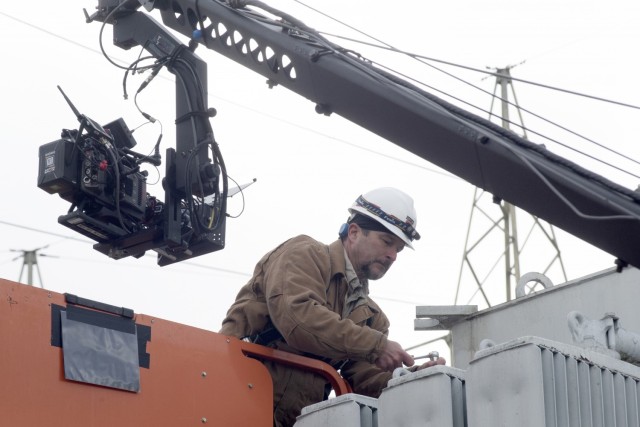 Senior Electrician Ron Gatlin is captured on video Nov. 2, 2021 working at the Center Hill Dam Switchyard in Lancaster, Tennessee, for a U.S. Army Corps of Engineers National Inventory of Dams video production. The Nashville District operates and maintains the project on the Caney Fork River in Lancaster, Tennessee. (USACE Photo by Leon Roberts)