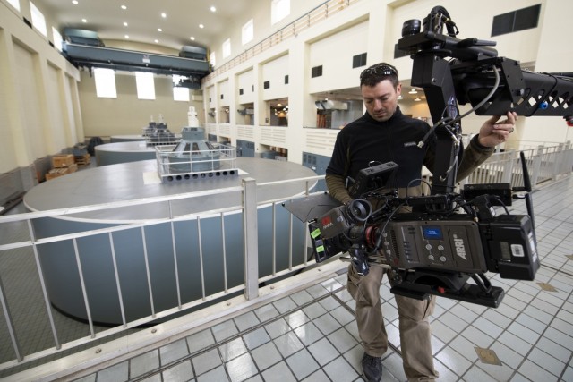 Jib Operator Tyler Spann with Open Jaw Productions prepares to capture video Nov. 2, 2021 of the Center Hill Dam Hydropower Plant for a U.S. Army Corps of Engineers National Inventory of Dams video production. The Nashville District operates and maintains the project on the Caney Fork River in Lancaster, Tennessee. (USACE Photo by Leon Roberts)