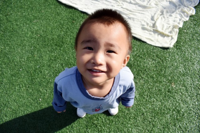 Taeseo Lee, 17 months, smiles for the camera at the Child Development Center at Ord Military Community, Nov. 4.