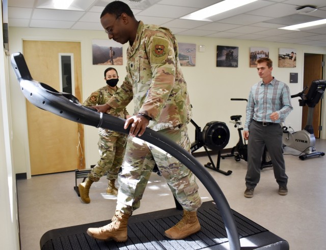 Air Force Lt. Col. William Taylor, commander of the 311th Training Squadron, tests a treadmill during a tour of the CalMed Physical Therapy Clinic in its new location in Bldg. 454, Presidio of Monterey, Calif., Nov. 9. Senior Master Sgt. Kristian...