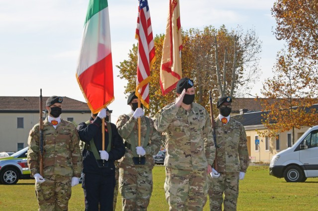 U.S. Army Command Sgt. Maj. Jonathan D. Dyon, incoming command Sgt. Maj. of U.S. Army Garrison Italy, takes the command during change of responsibility ceremony under Covid-19 prevention condition at Caserma Ederle, Vicenza, Italy Nov. 10, 2021. (U.S. Army Photos by Davide Dalla Massara)