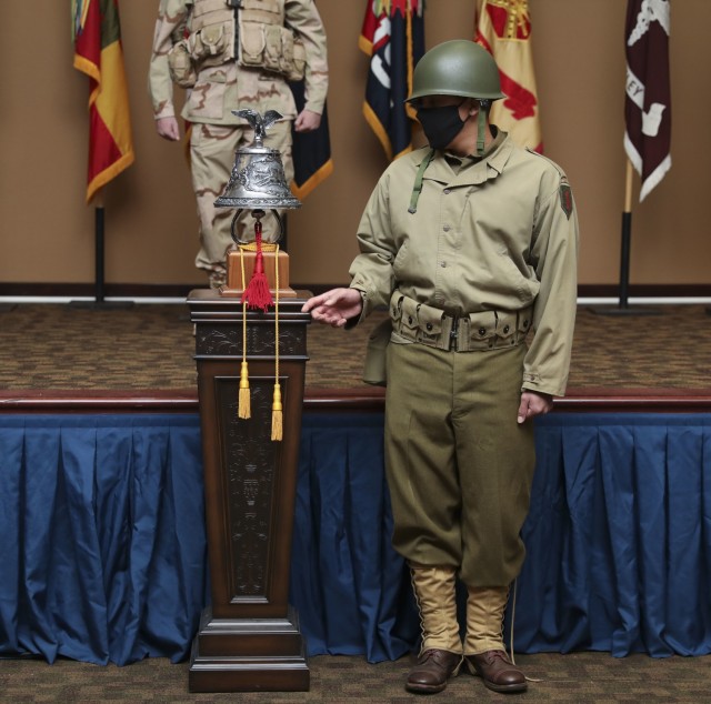 Pvt. Andres Duran, an infantryman assigned to 3rd Battalion, 66th Armored Regiment, 1st Armored Brigade Combat Team, portrays 1st Infantry Division Medal of Honor recipient Private First Class Francis McGraw during a commemoration ceremony Nov....