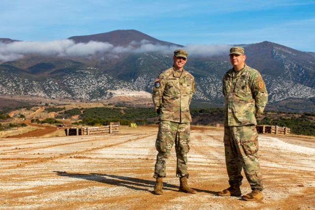 Capt. Ashton Woodard (left), commander of Charlie Company “Bandidos,” 1st Infantry Regiment, 1st Armored Brigade Combat Team, 1st Infantry Division, and Charlie Company 1st Sgt. Jeremy Bradley gather for a photo before the defensive operations event of the Hellenic Tank Challenge 2021, at Petrochori Range, Triantafyllides Camp, Greece, Nov. 3, 2021. 

“Our experience in Greece so far over the last week we&#39;ve been here has been an eye-opener for our Soldiers,” Bradley said. “They realized that everything that we trained for nine months out of the year to be able to shoot gunnery section and platoon live-fire, leading up to events like this to prove that we had the interoperability capabilities to train with our NATO partners. 